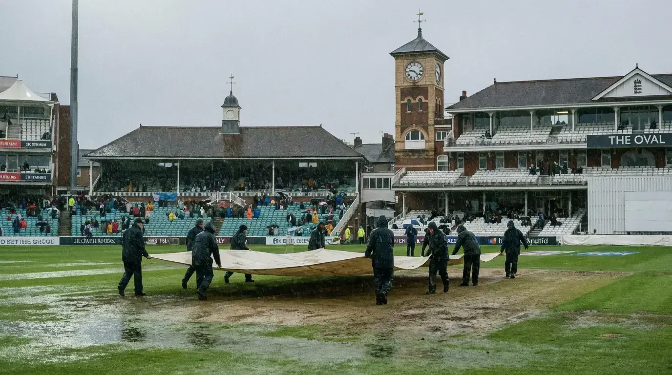 Rain delay at cricket ground with pitch covers deployed