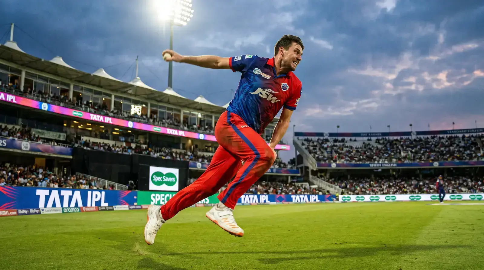 Cricket bowler delivering in The Hundred 100-ball format