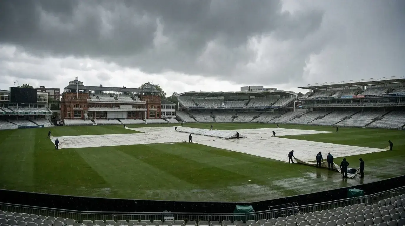 Rain covers on cricket pitch during Test match weather delay